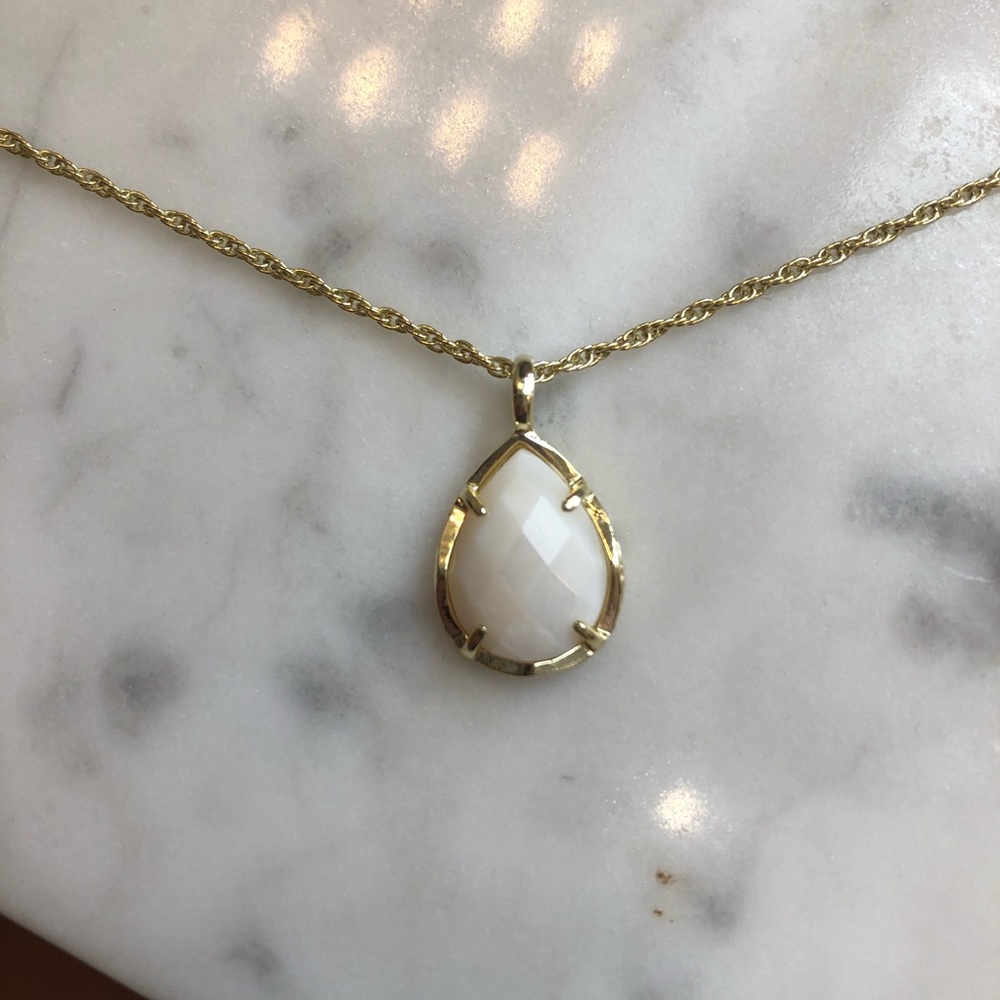 Kiri gold Kendra Scott necklace in white pearl